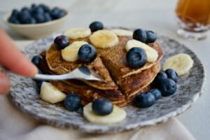 brown bread with blue berries on top